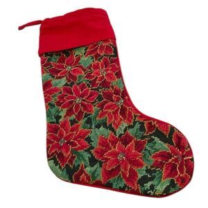 Needlepoint Christmas stocking poinsettias. They’ve been on one side.